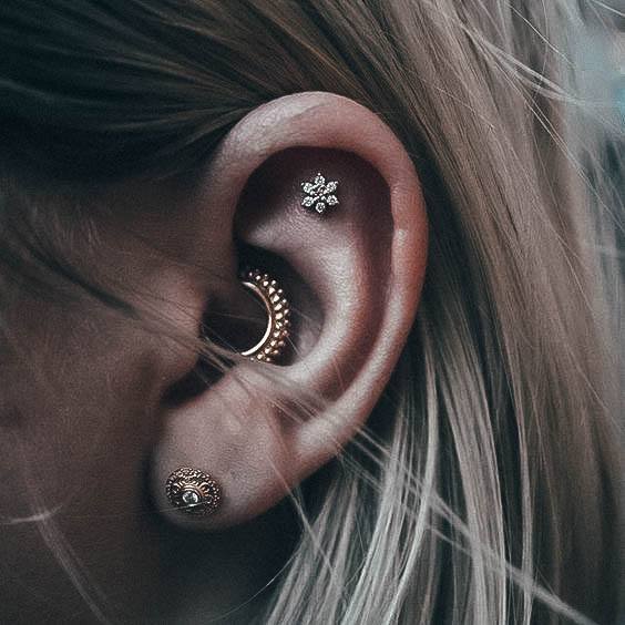 A Gold And A Floral Stud And A Matching Bright Gold Hoop Earring In The Daith Will Make Your Ear Pop