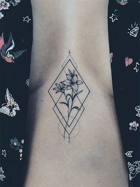 Abstract Geometrical And Rose Tattoo On Womens Chest
