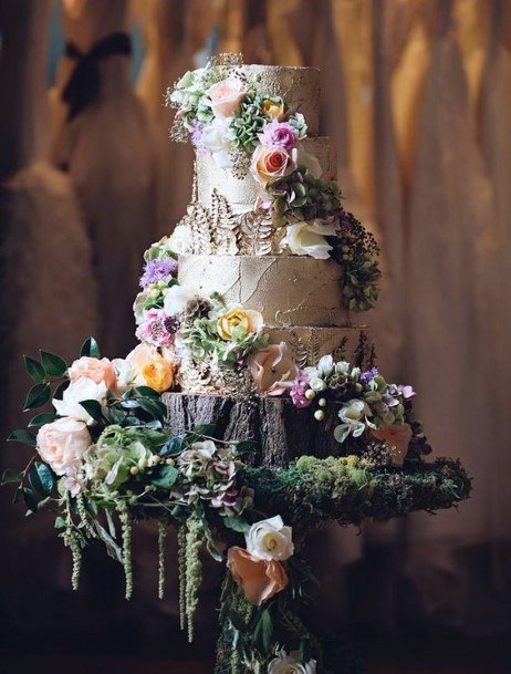 Abundant Flowers On Rustic Wedding Cake