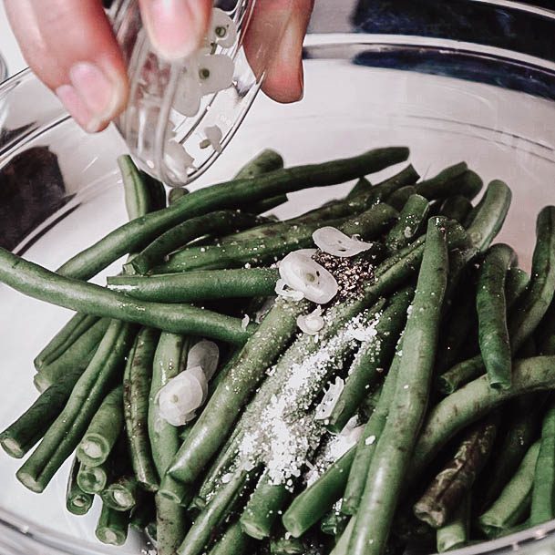 Adding Salt To Lemon Roasted Green Beans With Walnut Recipe