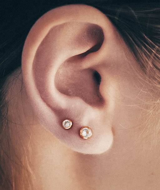 Admirable Stylish Gold With White Diamond Double Lobe Piercing Ideas For Girls