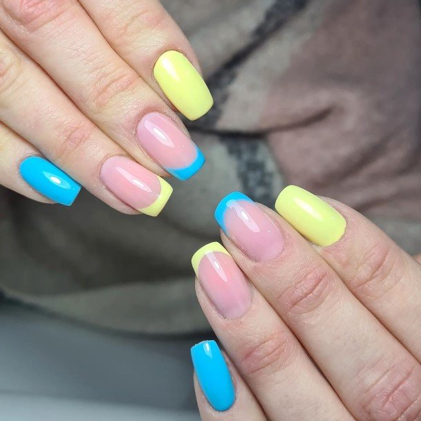 yellow and light blue nails