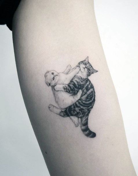 Adorable Fighting Pair Of Cats Tattoo For Women On Hands