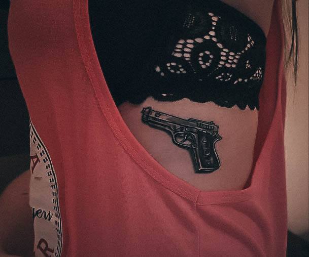 Adorable Gun Tattoo Designs For Women