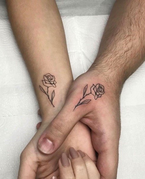 Adorable Rose Couple Tattoo On Hands
