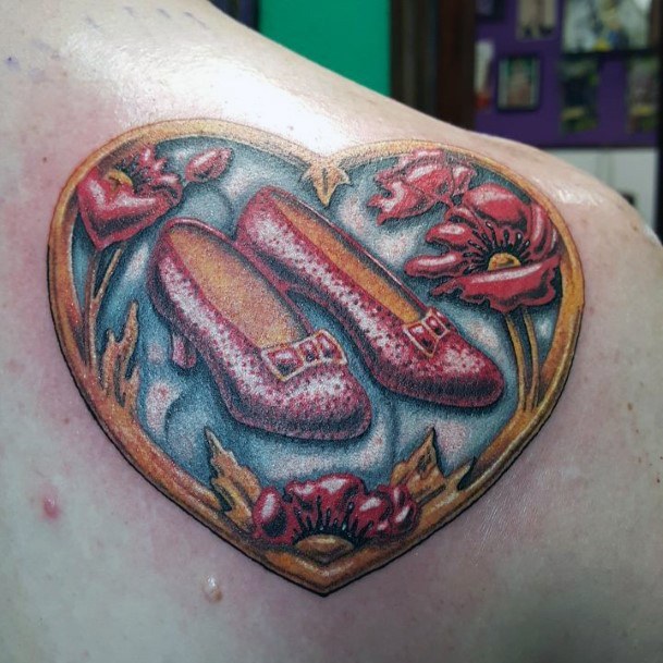 Ruby slippers for MaryAnne and a football for George  Dollys Skin Art  Tattoo Kamloops BC