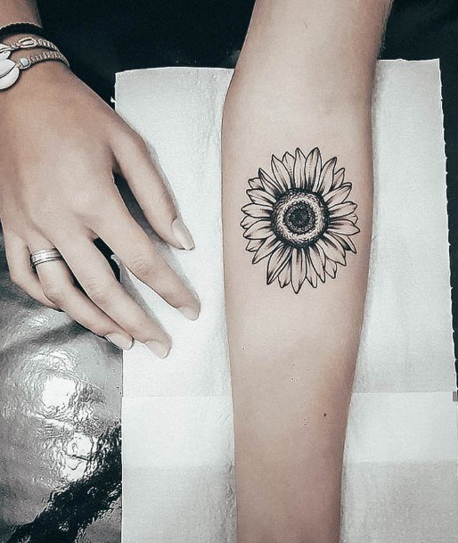 Aesthetic Daisy Tattoo On Woman Forearm