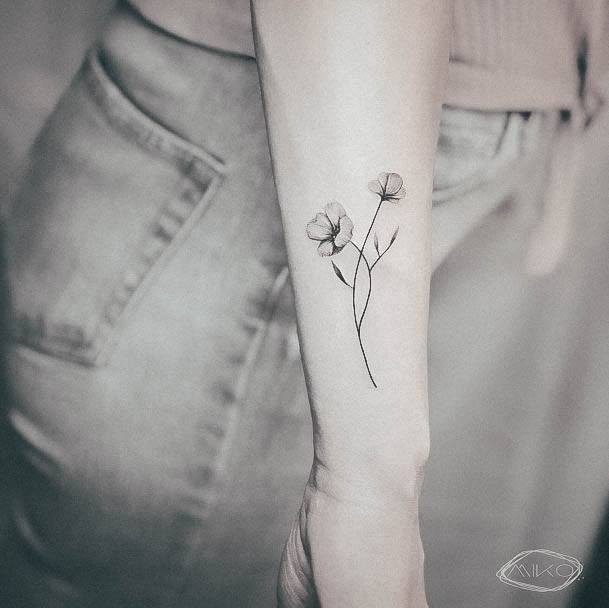 Aesthetic Floral Tattoo On Woman