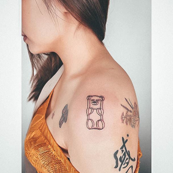 Aesthetic Gummy Bear Tattoo On Woman Shoulder Outline