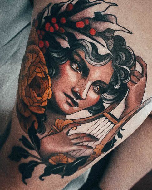 Aesthetic Harp Tattoo On Woman