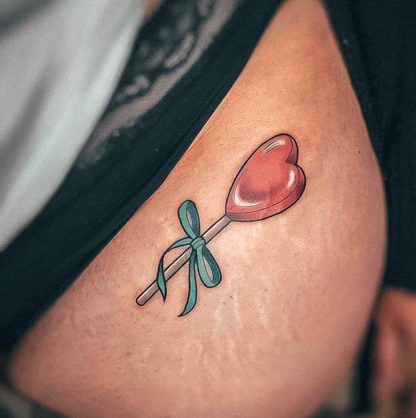 Aesthetic Lollipop Tattoo On Woman