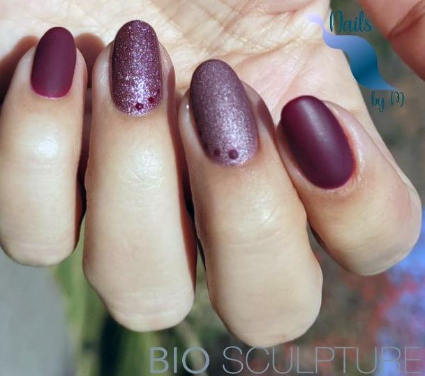 Aesthetic Maroon Glitter Nail On Woman