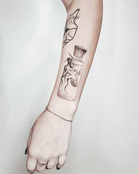 Aesthetic Octopus Tattoo On Woman Forearm Bottle Design