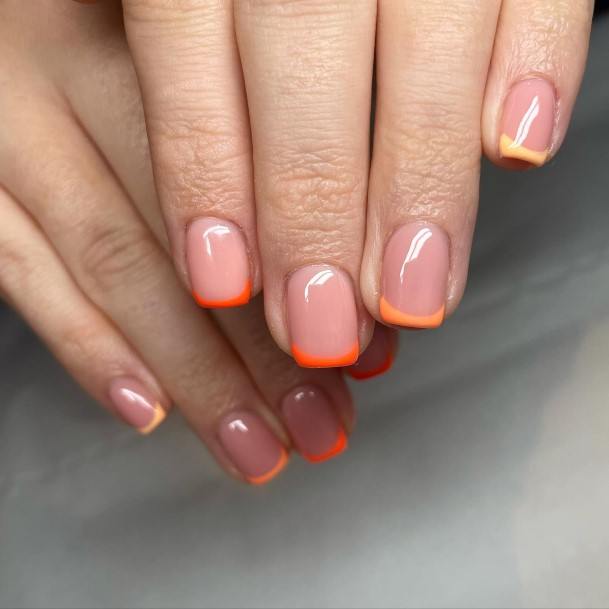 Aesthetic Orange French Tip Nail On Woman