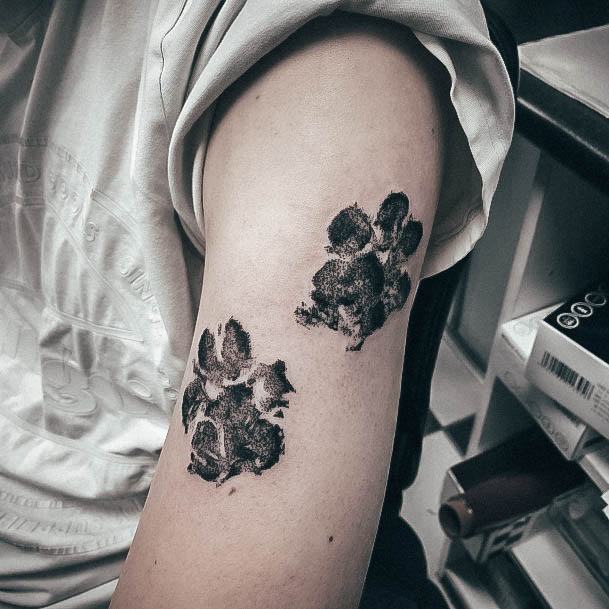 Aesthetic Paw Print Tattoo On Woman Arm