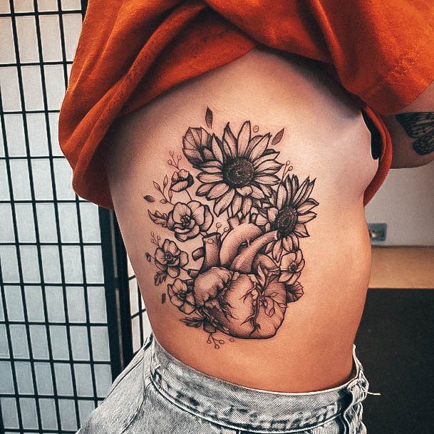 Aesthetic Rib Tattoo On Woman Heart Flowers