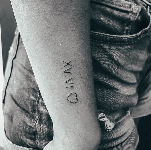 Aesthetic Roman Numeral Tattoo On Womans Forearm