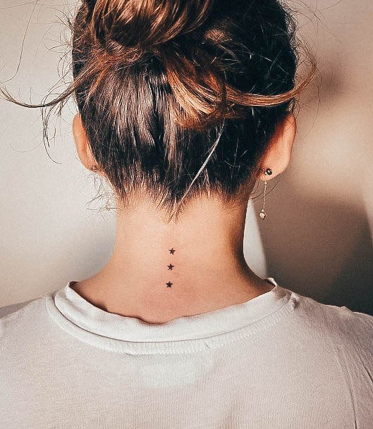 Aesthetic Star Tattoo On Woman Neck