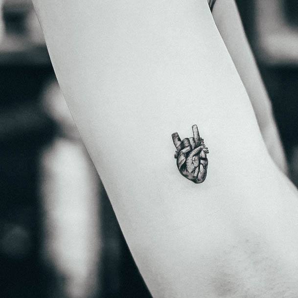 Aesthetic Tiny Tattoo On Woman Heart Forearm