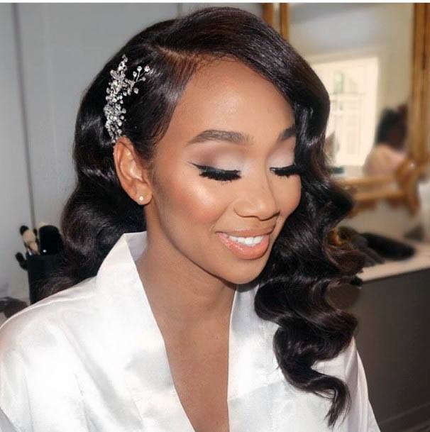 African American Formal Hairstyle With Large Waves And Wedding Headpiece