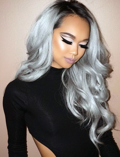 African American Woman With Sleek Long Full Bodied Grey Hairstyle