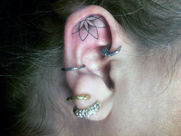 Alluring Ladies Ear Tattoo Ideas Flower