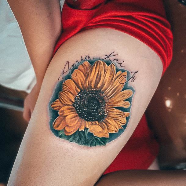 Alluring Ladies Kids Name Tattoo Ideas Thigh Sunflower