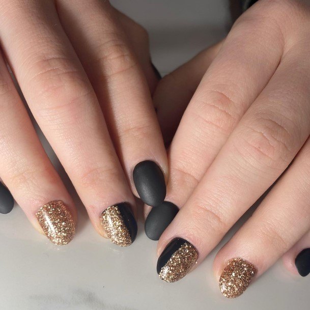 Alluring Ladies Matte Black And Gold Nail Ideas