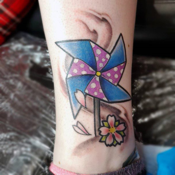 Alluring Ladies Pin Wheel Tattoo Ideas