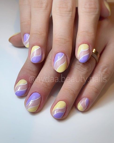 Alluring Ladies Purple And Yellow Nail Ideas