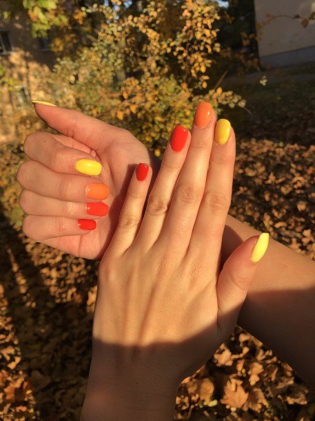 Alluring Ladies Red And Yellow Nail Ideas