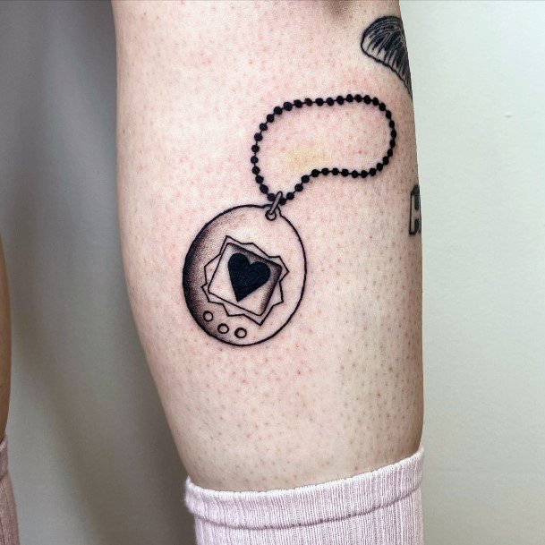 Alluring Ladies Tamagotchi Tattoo Ideas