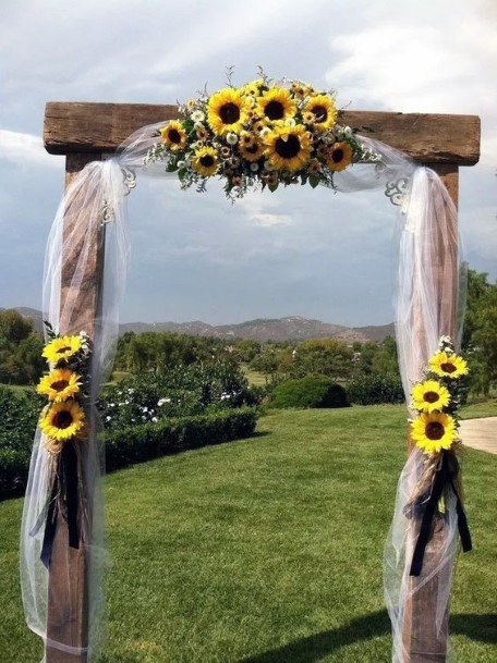 Amazing Tall Brown Arch Gorgeous Valance Drape Pinned Yellow Sunflower Inspiration Summer Wedding