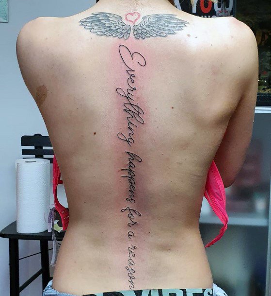 Angel Wings And Quote Tattoo Womens Spine