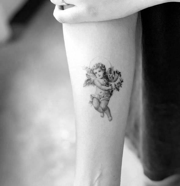 Angel With Flowers Tattoo Womens Hands