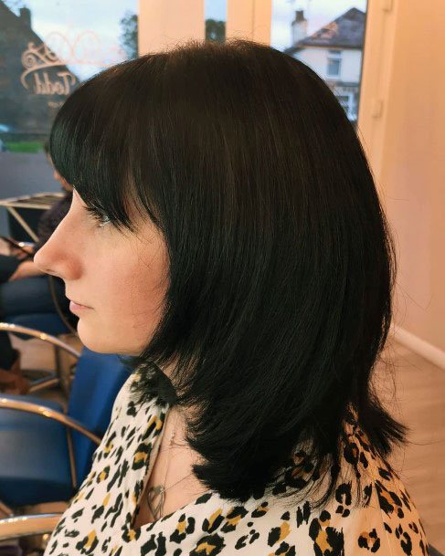 Angled Choppy Locks With Bangs Women