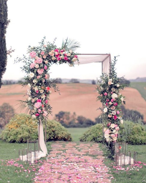 Angular Arch With June Wedding Flowers