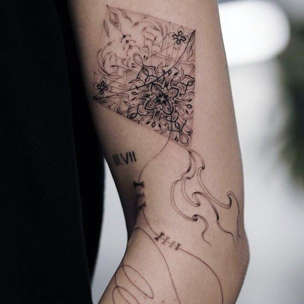 Appealing Womens Bicep Tattoos