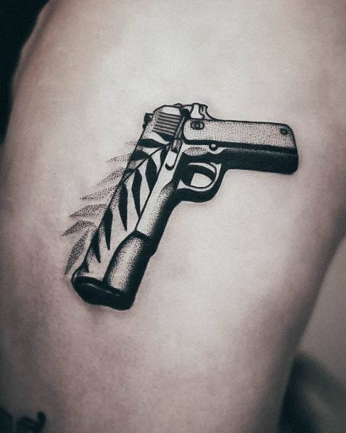 Appealing Womens Gun Tattoos With Leaf Shaded Black And Grey