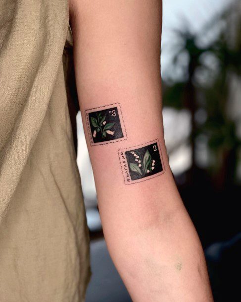 Appealing Womens Postage Stamp Tattoos