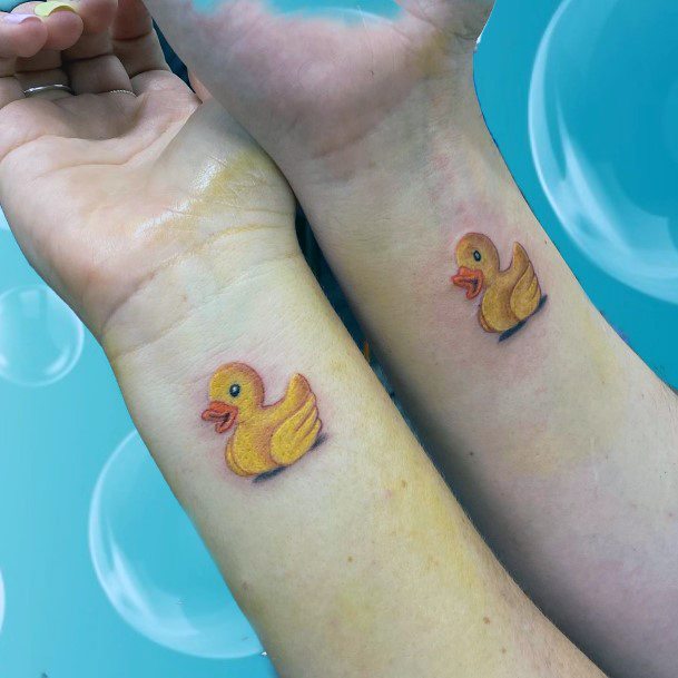 Rubber Duck With Kambri Banner Tattoo On Right Bicep