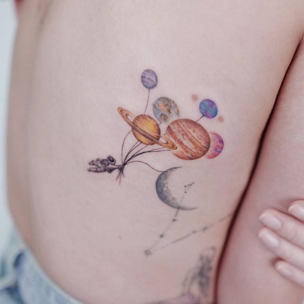 Appealing Womens Saturn Tattoos