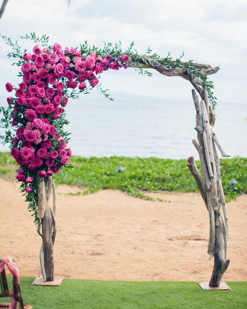 Arch With Dark Pink June Wedding Flowers