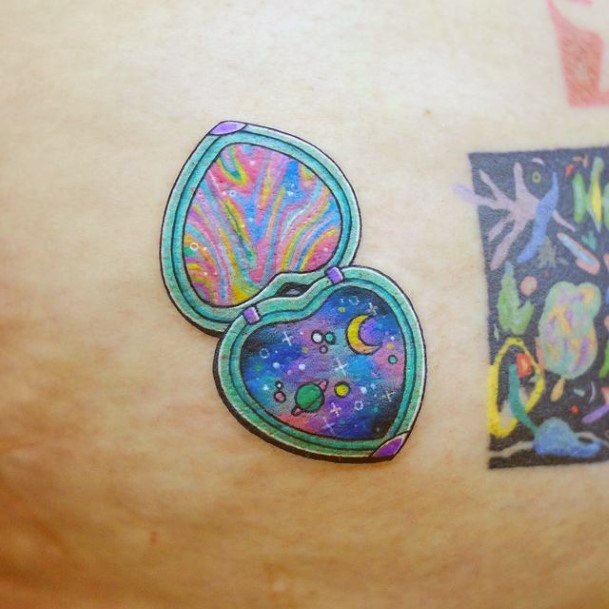 Art Locket Tattoo Designs For Girls