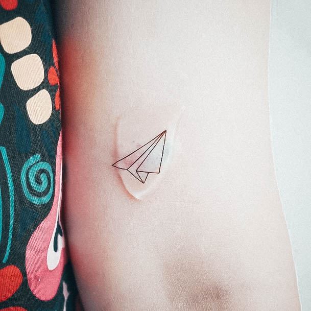 Artistic Airplane Tattoo On Woman