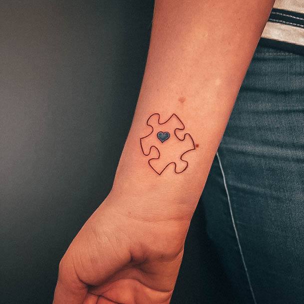 Artistic Autism Tattoo On Woman