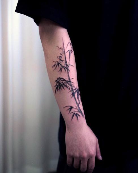 Artistic Bamboo Tattoo On Woman