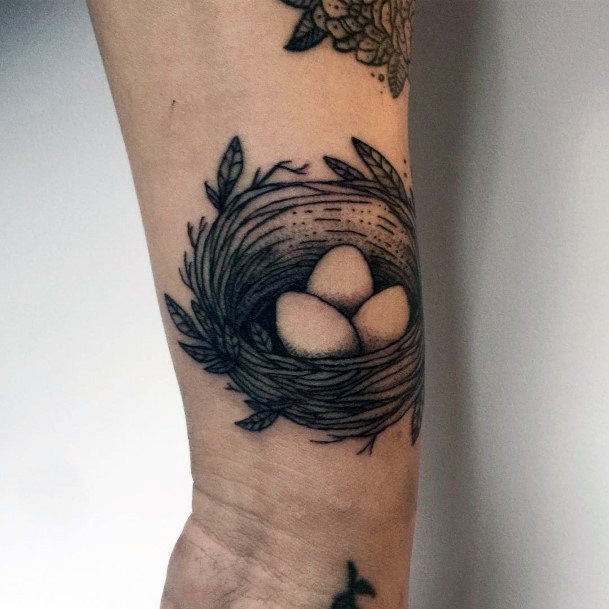 Artistic Birds Nest Tattoo On Woman