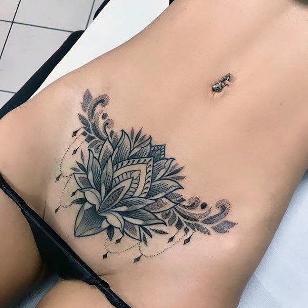 Artistic Black Ink Tattoo On Woman