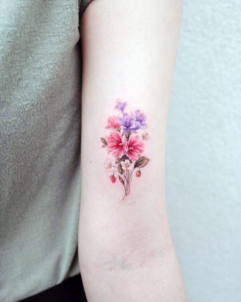 Artistic Bouquet Tattoo On Woman